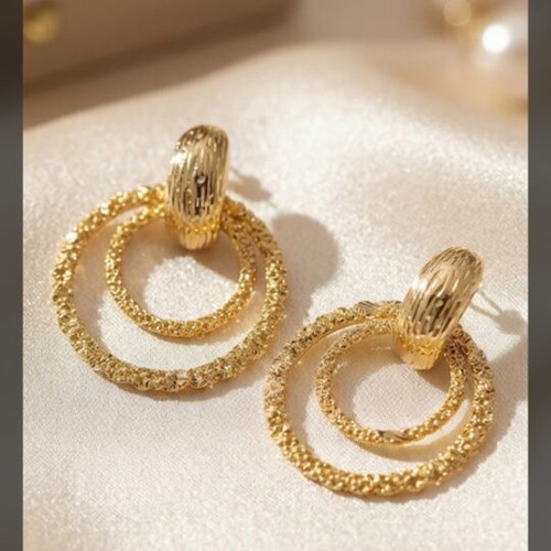Hebe earrings in gold with zircon and hammered design like new
