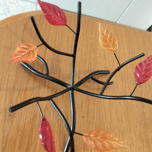 Decorative table ornament with flower designs, like new