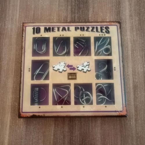 Metal puzzle set of 10 purple pieces like new, for kids 7+