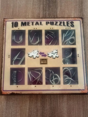 Metal puzzle set of 10 purple pieces like new, for kids 7+