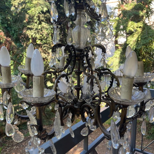 Antique chandelier used with bronze and crystal