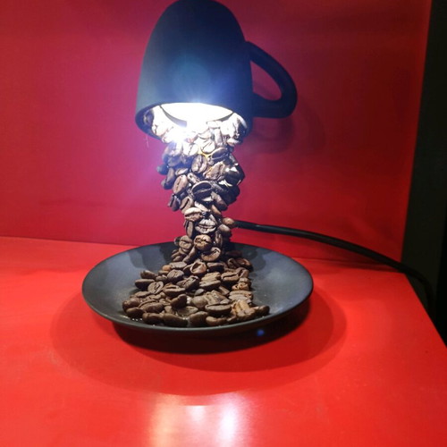 Handmade table lamp with porcelain, coffee beans, and 12 LED lights