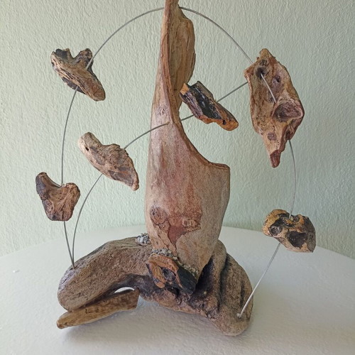 Handmade table decor with driftwood and metal design
