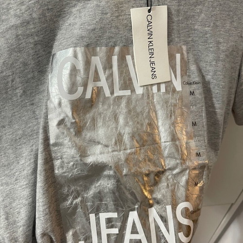 Calvin Klein grey T-shirt with silver logo new with tags size M