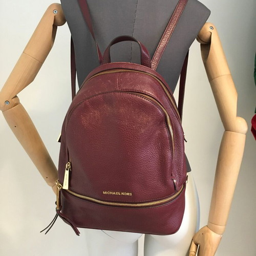 Michael Kors genuine leather backpack used, red