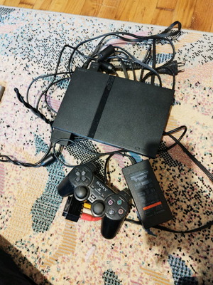 Playstation 2 used with controller, 8GB memory card and cables
