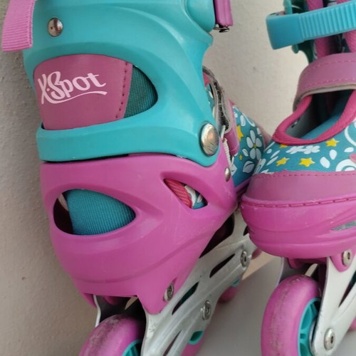 Xspot adjustable rollers size 35/37 used, turquoise pink with flowers