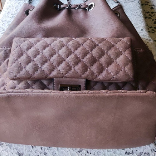 Backpack like new with quilted texture and handles
