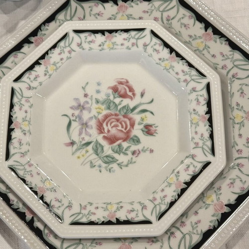 Vintage porcelain 37-piece dinnerware set with floral design