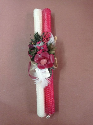 Easter candle new with wax decorations and dried flowers