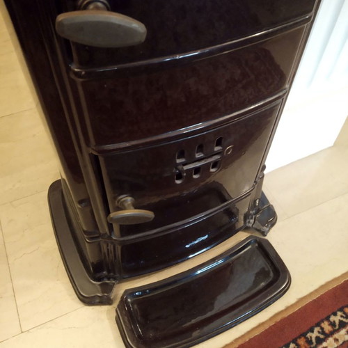 Beautiful Antique - Cast iron stove with outer dark brown glazing