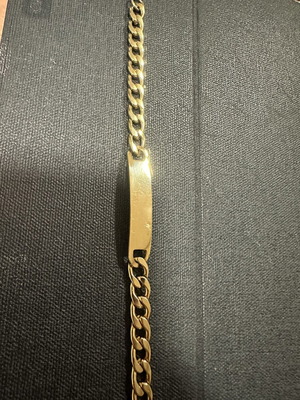Identity bracelet in gold color with polished plate