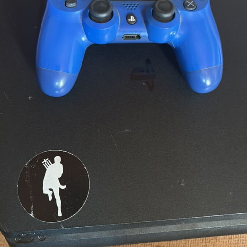 PlayStation 4 Slim 1TB console with original controller