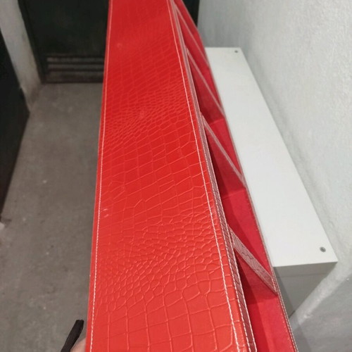 Shelf with red leather upholstery used, 5 compartments for CDs
