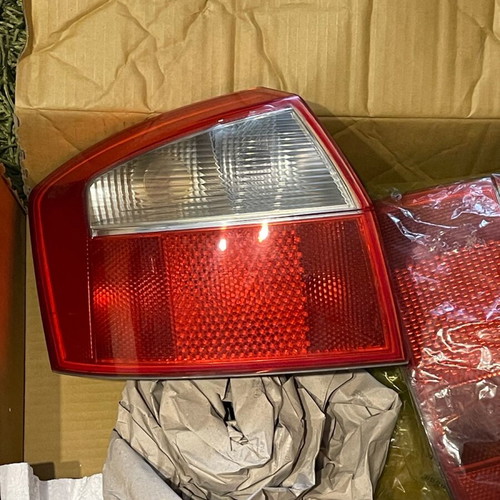 Audi A4 B6 sedan rear lights used, original with middle stop