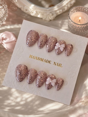 Press-on nails handmade, reusable, pink glitter with bow, set of 10