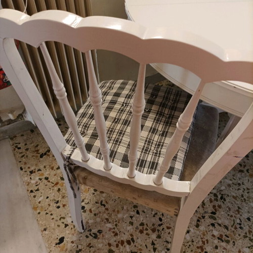 Round dining table with four chairs used, white
