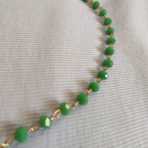 Long necklace new with beads and green leaf motif