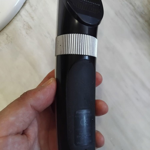 Panasonic ER1511 professional hair clipper with charger and combs