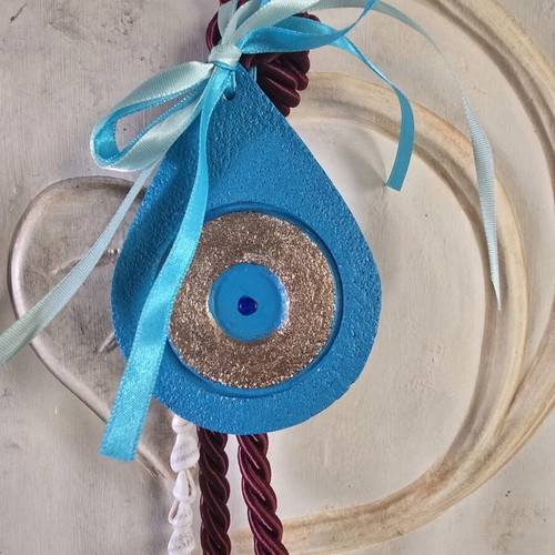 Handmade eye charm from porcelain with a summer touch