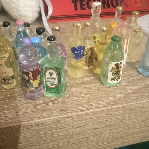 Miniature bottles collection like new, set of 25 for decoration