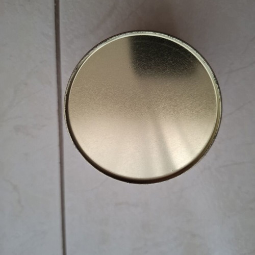 Apple round metal storage tin with Looney Tunes '00, like new
