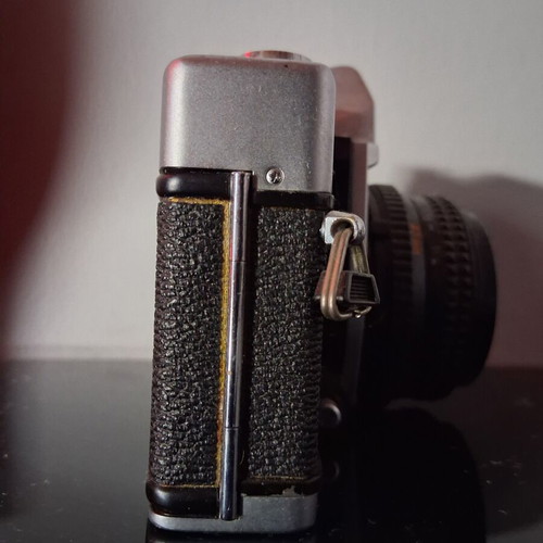 Minolta SRT 100X 35mm SLR camera used with Minolta MD Rokkor 45mm f/2 lens