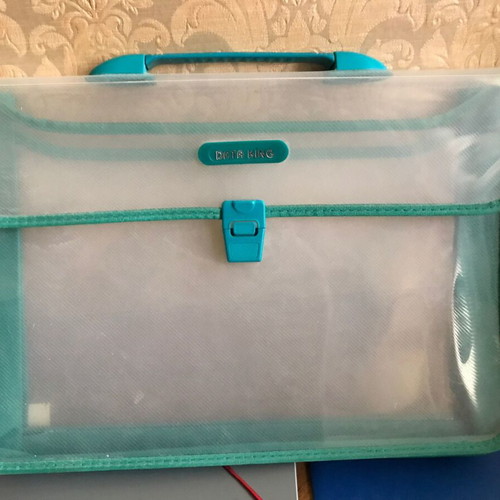 Plastic bag, thick plastic folders, cardboard folders and slides like new
