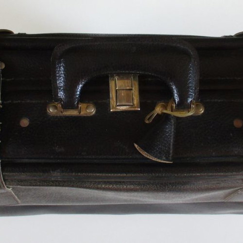 Leather travel suitcase used, 1980s, with wheels and locks