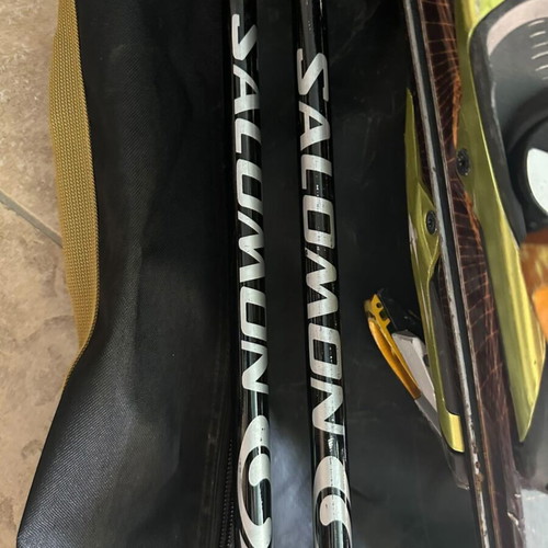 Salomon ski equipment used with bag, skis and poles