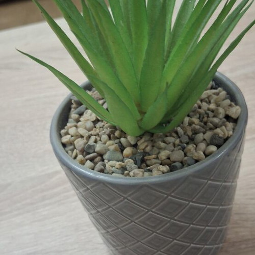 Artificial flower in ceramic pot