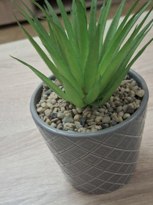 Artificial flower in ceramic pot