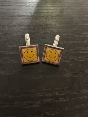 Cufflinks smiley like new, silver color