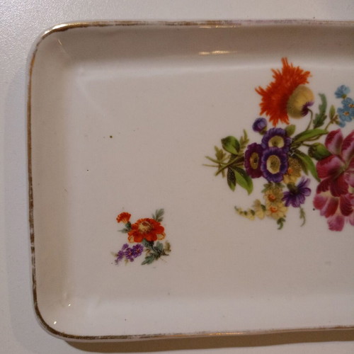 Porcelain tray used with flowers and golden accents