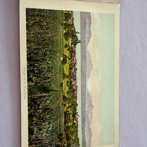 Leather-bound book with used Swiss Geneva postcard images