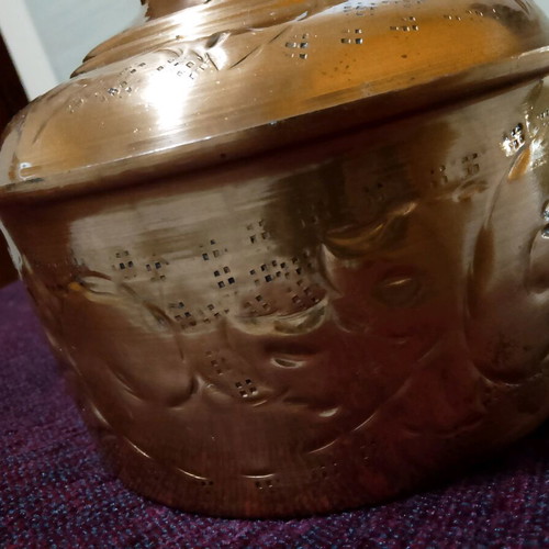 Copper decorative vessel with lid like new, embossed design