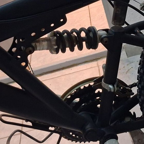 Mountain bike black used with front and rear suspension, V-brakes