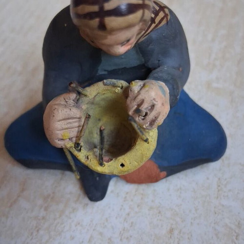 Ceramic figure by N Kourtzis from Agiasos Lesvos, used