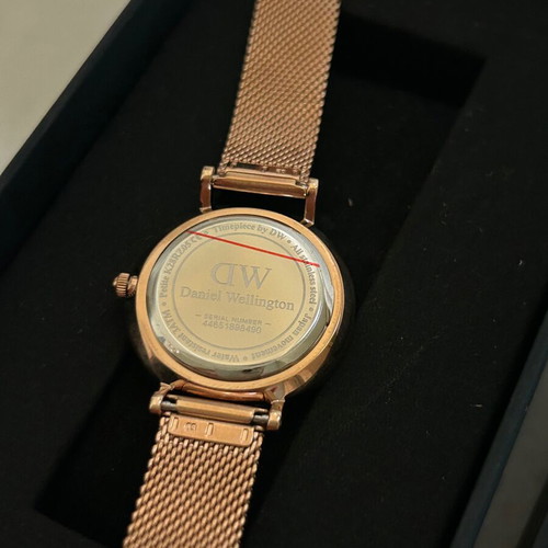 Daniel Wellington Petite Unitone watch with rose gold metal bracelet