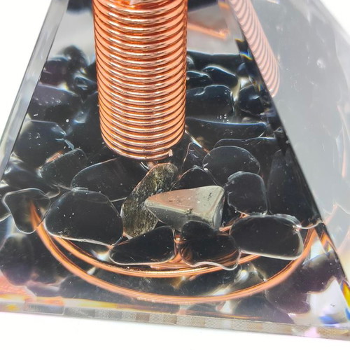 Orgonite pyramid with black obsidian and copper like new
