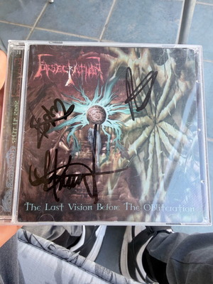 Metal split CD Obsecration / Korrodead like new, signed