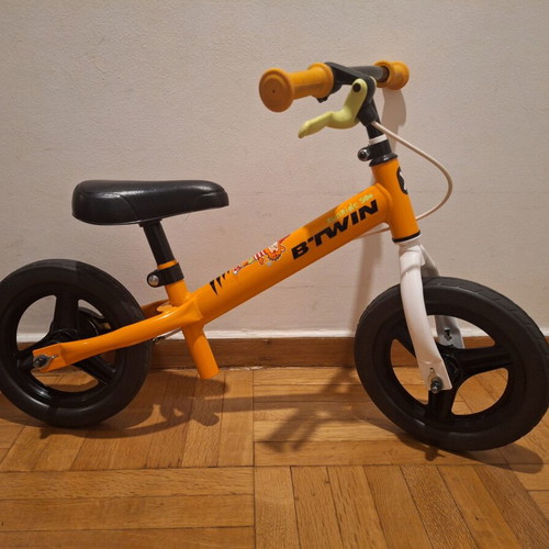 Balance bike for children, orange, adjustable height