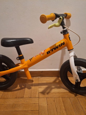 Balance bike for children, orange, adjustable height