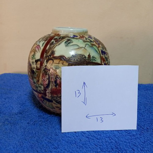 Satsuma vase used with handpainted floral motifs and crackle glaze