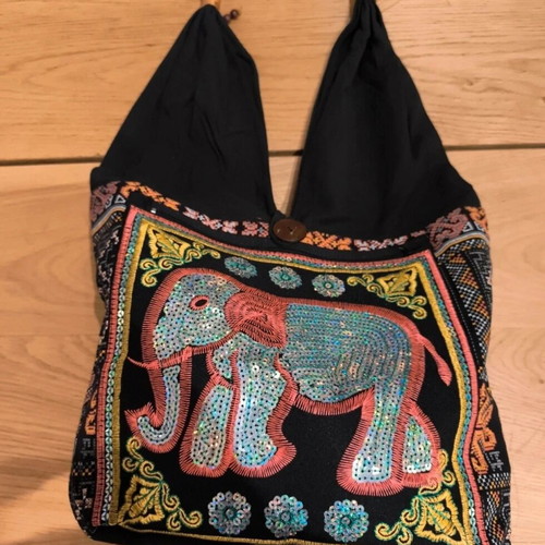Embroidered shoulder bag like new, black multicolor