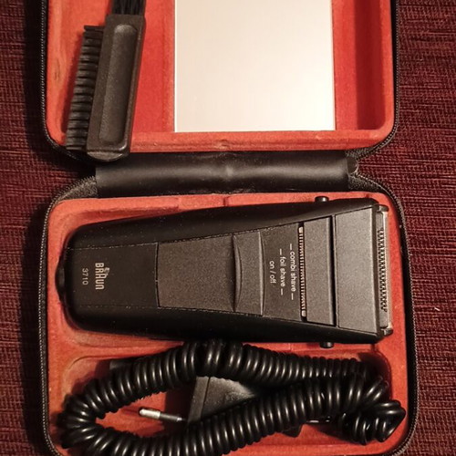 Vintage Braun electric shaver used with case and extra device