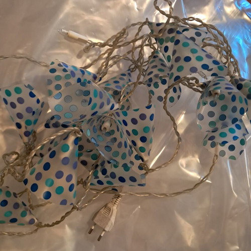 Decorative hanging lights used, blue polka dot