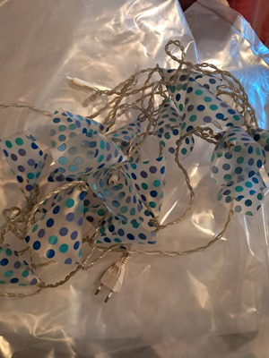 Decorative hanging lights used, blue polka dot