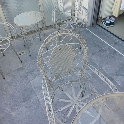 Fer Forge garden sofa set like new with chairs, tables, and two-seater couch