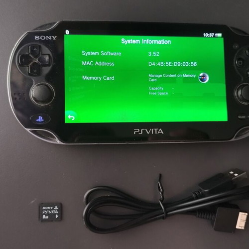 Sony PlayStation Vita PCH-1004 OLED used with memory and USB charger